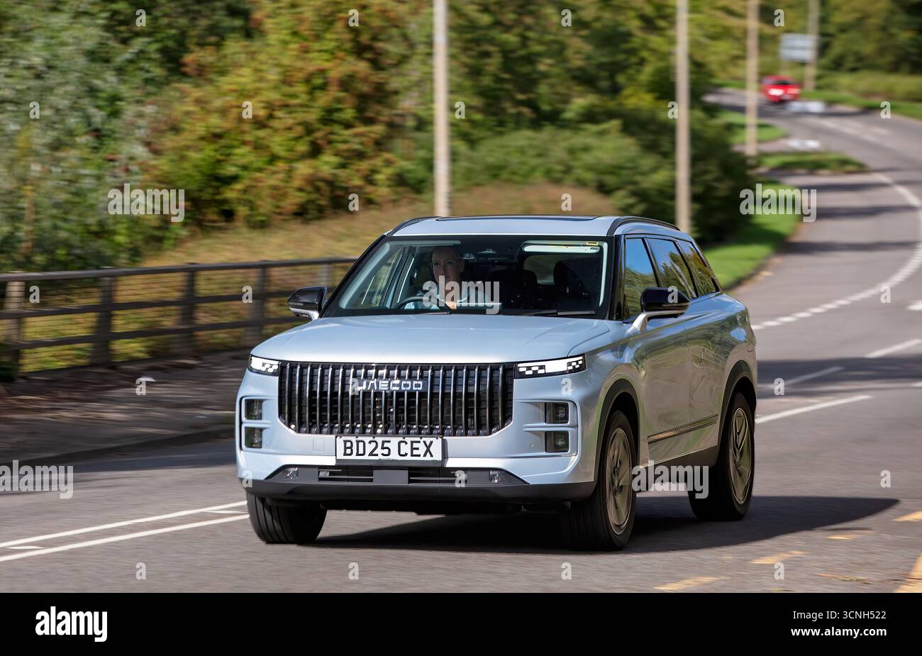 Milton Keynes,Bucks,UK - Sept. 21st 2025:  2025 Jaecoo 7 hybrid electric car., a Chinese built SUV driving on a British road Stock Photo