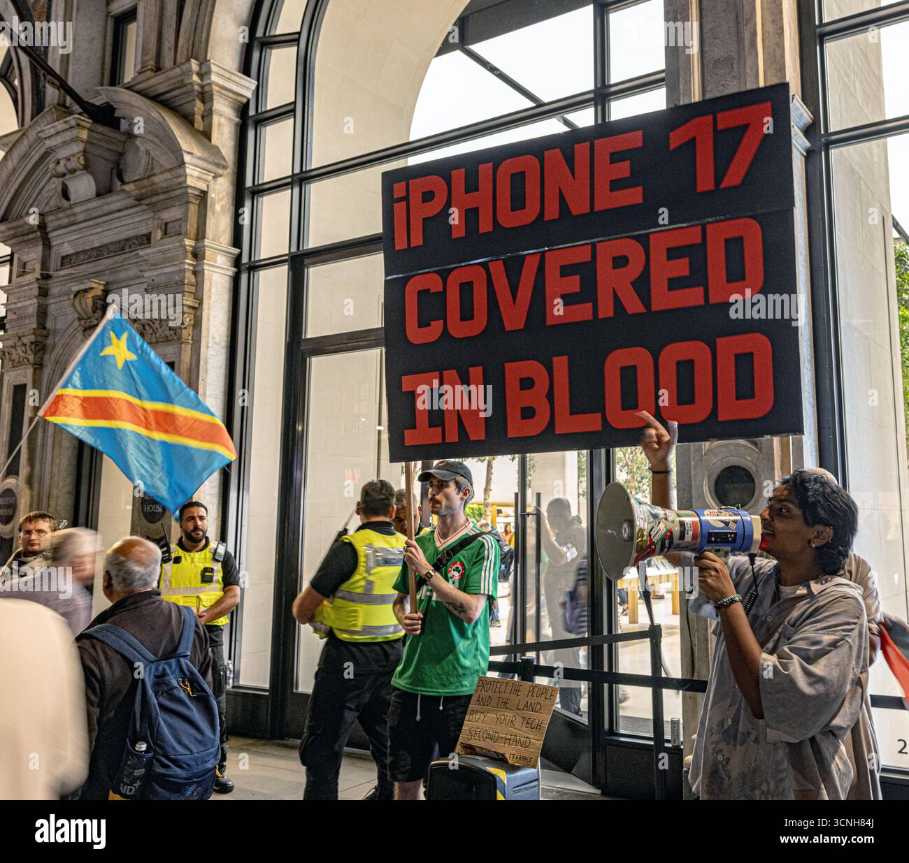 Protesters rally outside an Apple store in central London calling for a ...