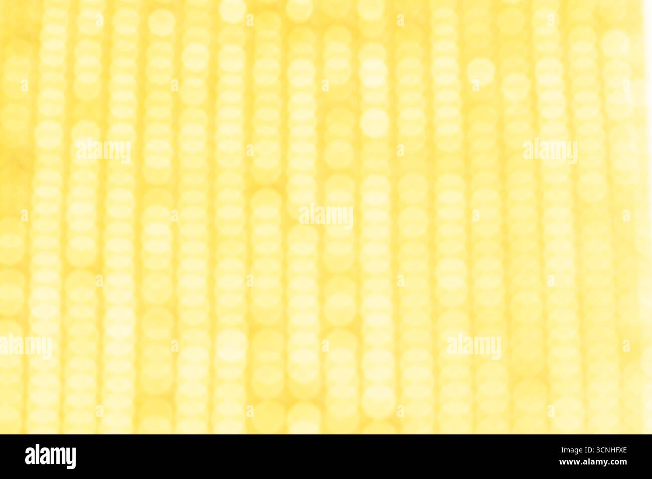 Abstract yellow bokeh background. Soft light defocused spots Stock Photo