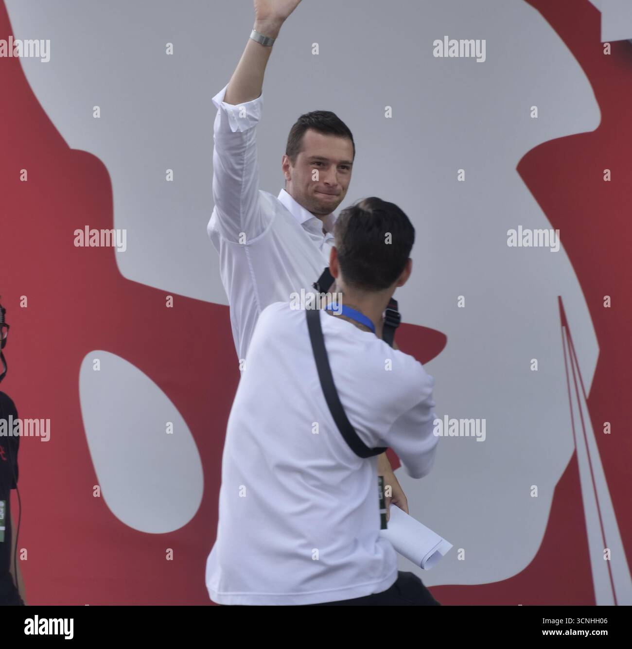 Pontida, Italy. 21st Sep, 2025. Jordan Bardella, MEP and president of Resemblance National, guest on stage at the annual rally of Salvini's League in Pontida. Credit: Independent Photo Agency/Alamy Live News Stock Photo