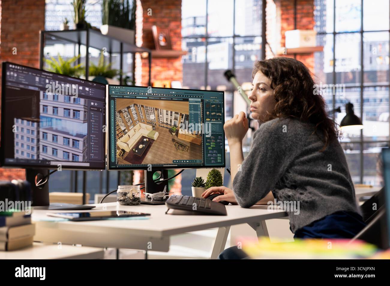 Woman developer works on an interior design project using CAD software ...