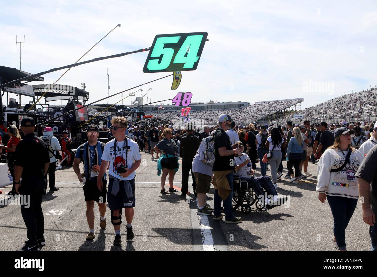 LOUDON, NH - SEPTEMBER 21: Fans line the pits during prerace for the ...