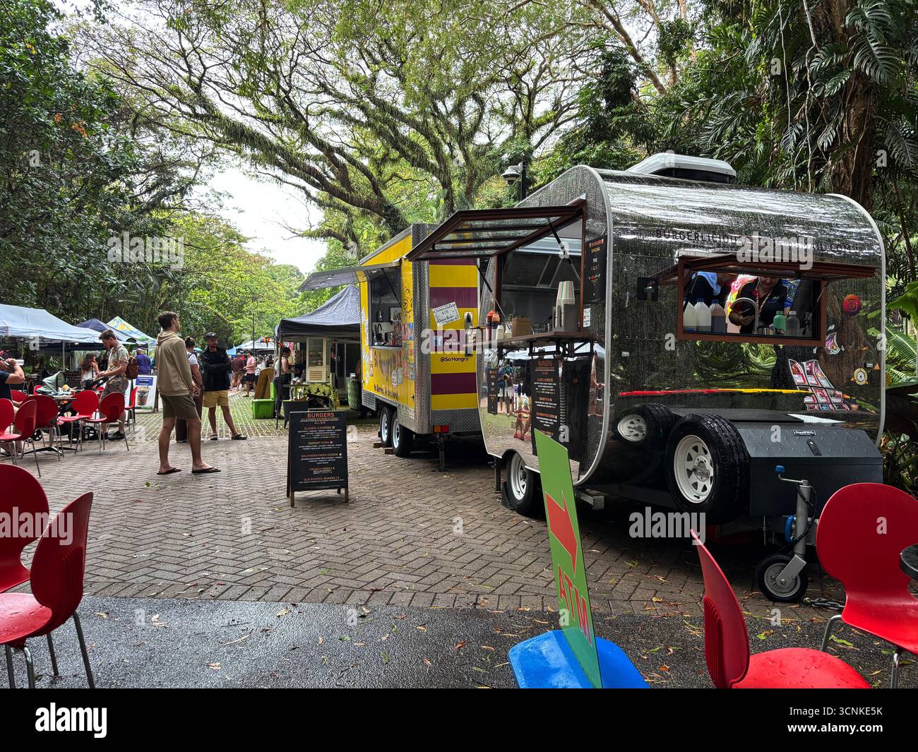 Food trucks and stalls at outdoor markets, The Tanks, Collins Avenue, Edge Hill, Cairns, Queensland, Australia. No MR or PR - Smartphone Captured Stock Image