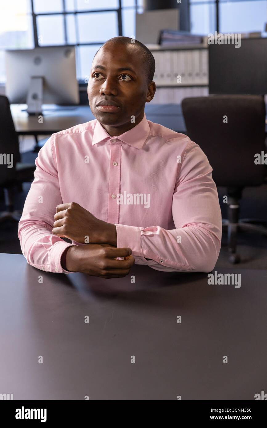 Man in pink shirt hi-res stock photography and images - Alamy