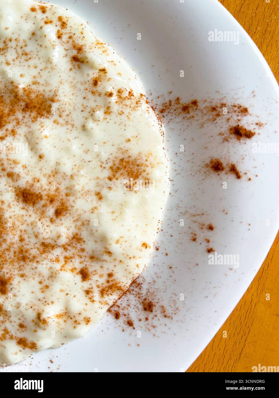 Rice pudding with cinnamon. Spain. - Smartphone Captured Stock Image