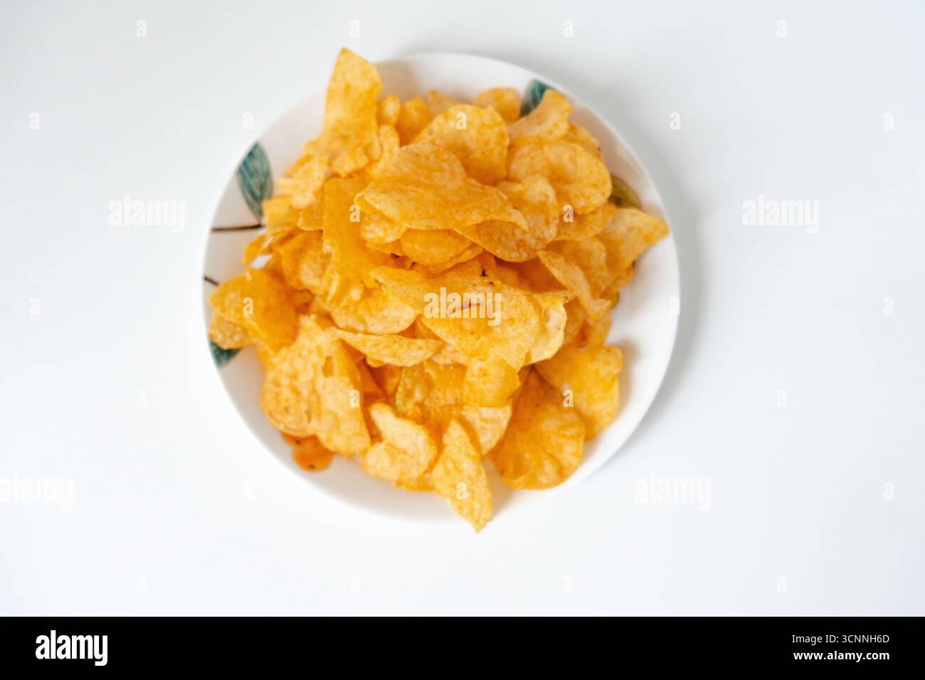 Potato chips on a plate Stock Photo