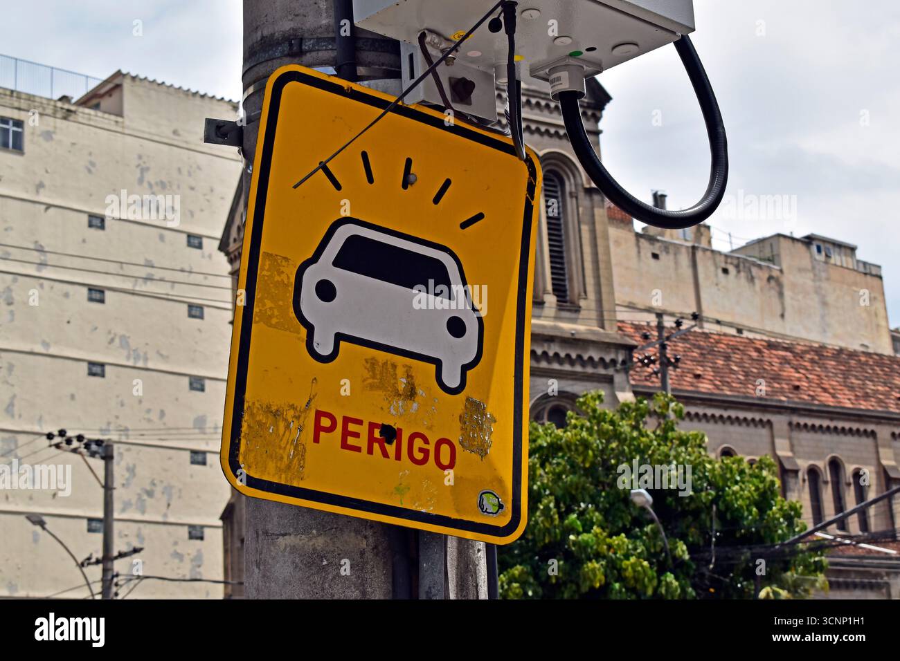 Street sign indicating DANGER (PERIGO in Portuguese language), Rio de Janeiro, Brazil Stock Photo