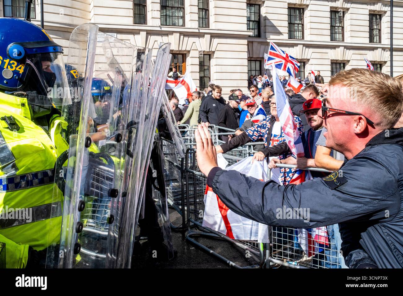 Marchers Confront Metropolitan Police Officers Standing Behind Riot ...