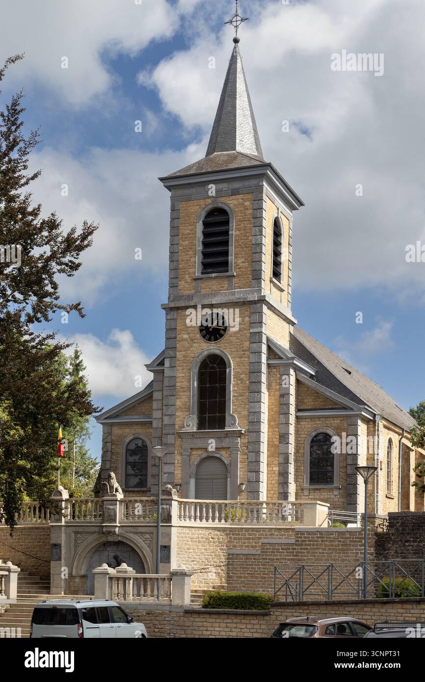 Exterior view of Our Lady of the Assumption Catholic church in the village of Tintigny, in Luxembourg province, Belgium. - Stock Image