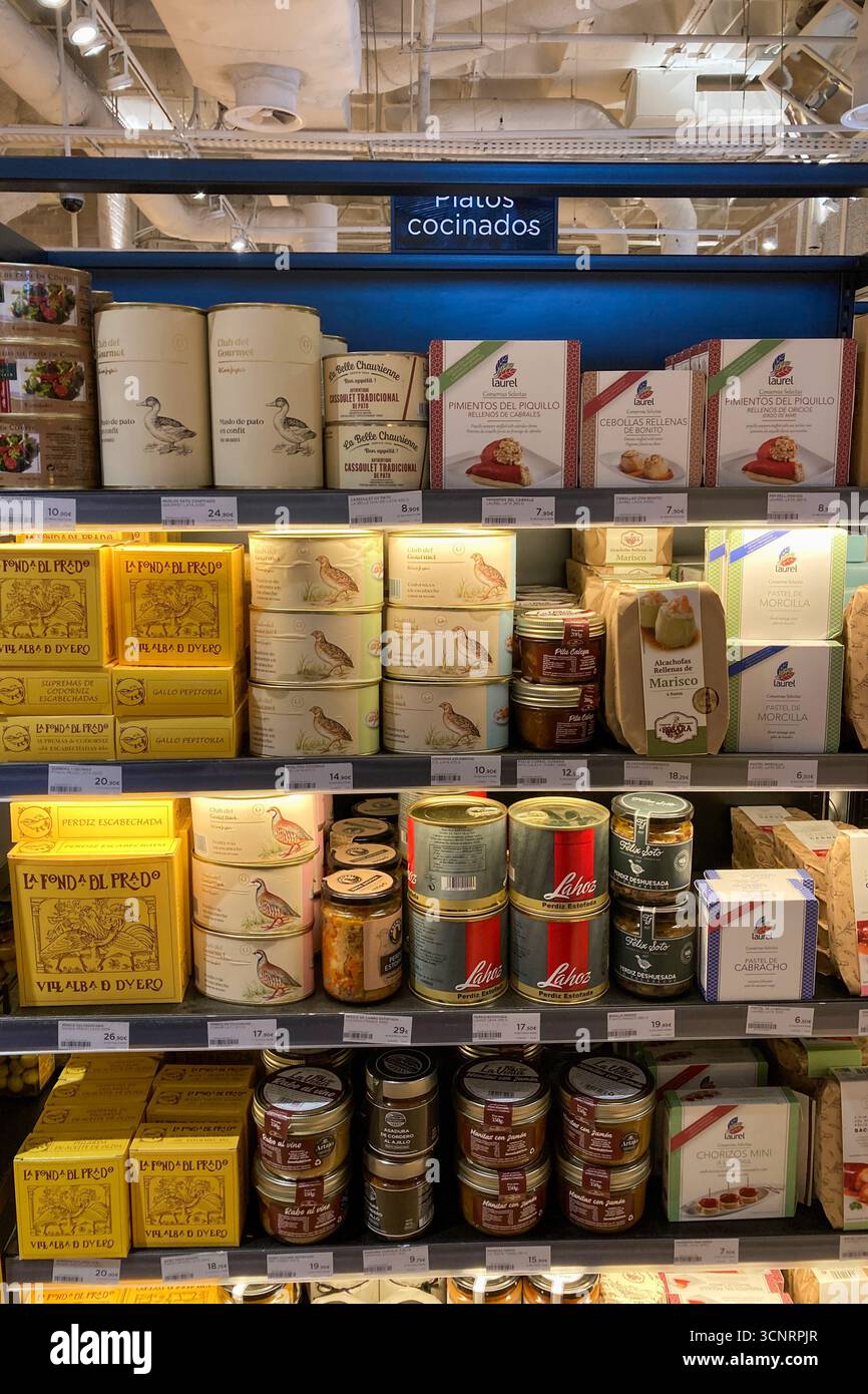 MALAGA, SPAIN - JULY 10, 2025: Shelves in El Corte Inglés supermarket in Malaga, Spain, are neatly stocked with a wide variety of food and beverages, - Smartphone Captured Stock Image