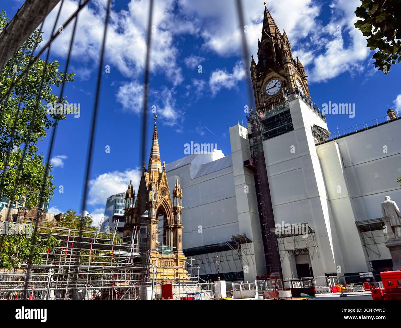 Wraps are started to be removed from the construction site surrounding Manchester town hall, which is under renovation Stock Photo