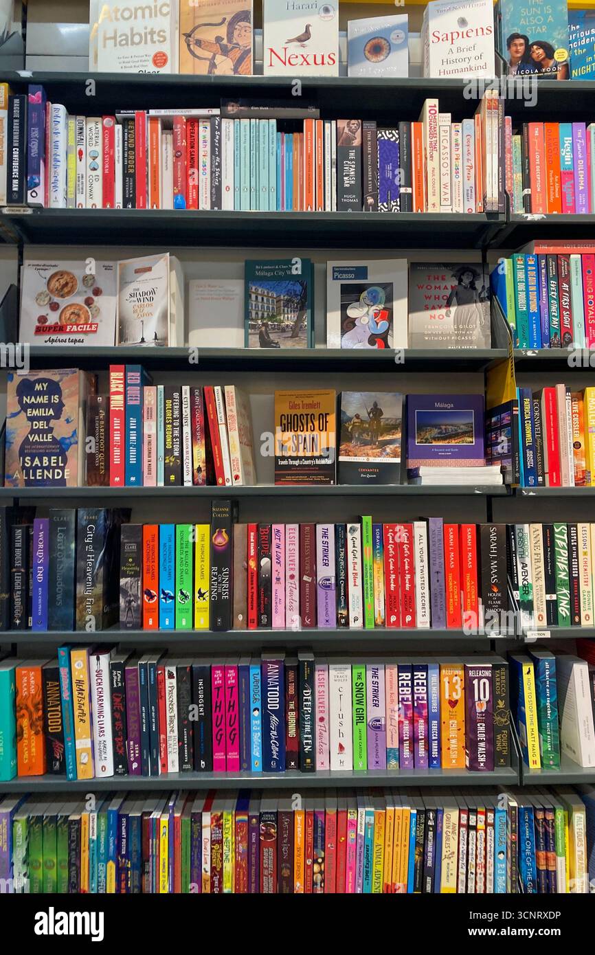MALAGA, SPAIN - JULY 10, 2025: Luces bookstore in Malaga, Spain, with shelves full of books, a cozy interior, and a welcoming literary atmosphere. - Smartphone Captured Stock Image