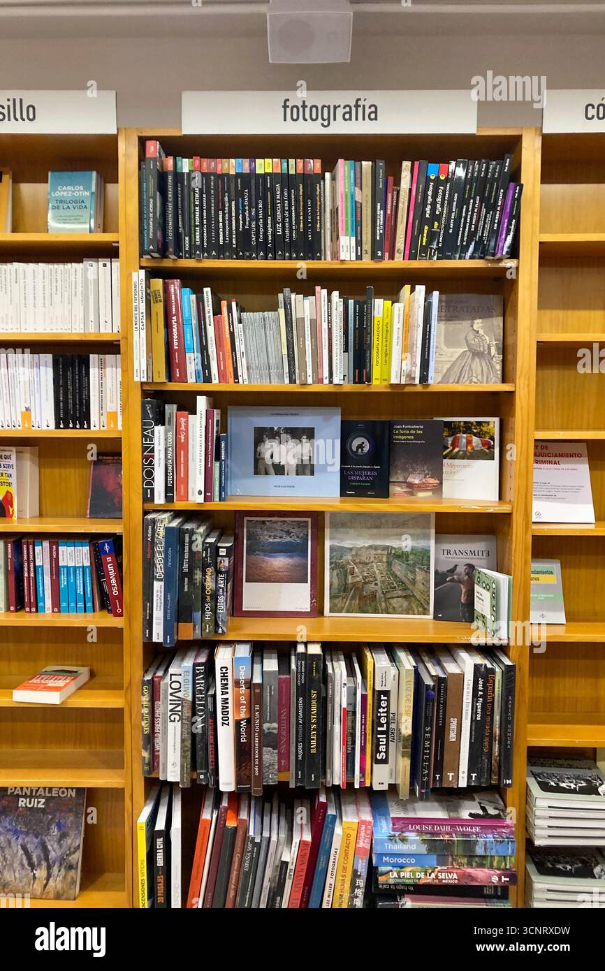 MALAGA, SPAIN - JULY 10, 2025: Luces bookstore in Malaga, Spain, with shelves full of books, a cozy interior, and a welcoming literary atmosphere. - Smartphone Captured Stock Image