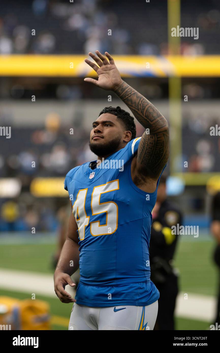 Los Angeles Chargers linebacker Tuli Tuipulotu (45) waves towards the ...