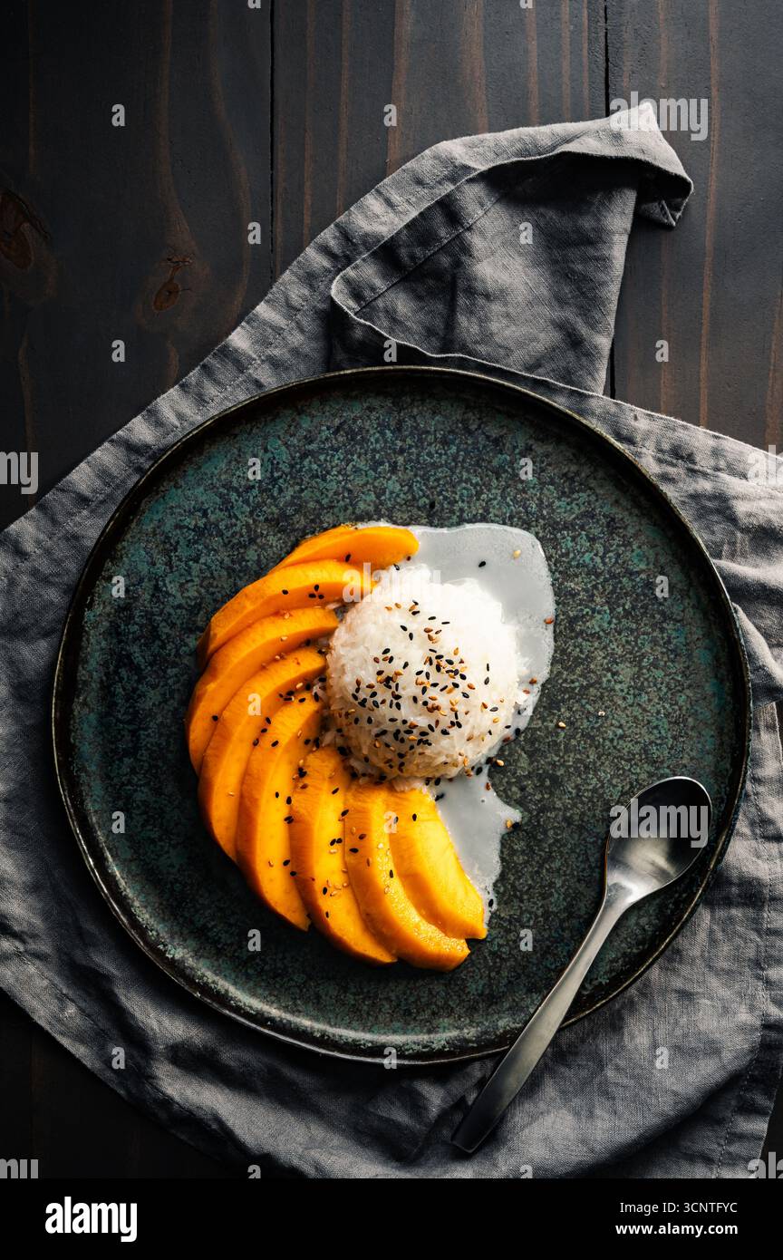 Mango Sticky Rice Drizzled with Coconut Sauce Overhead: Thai dessert ...