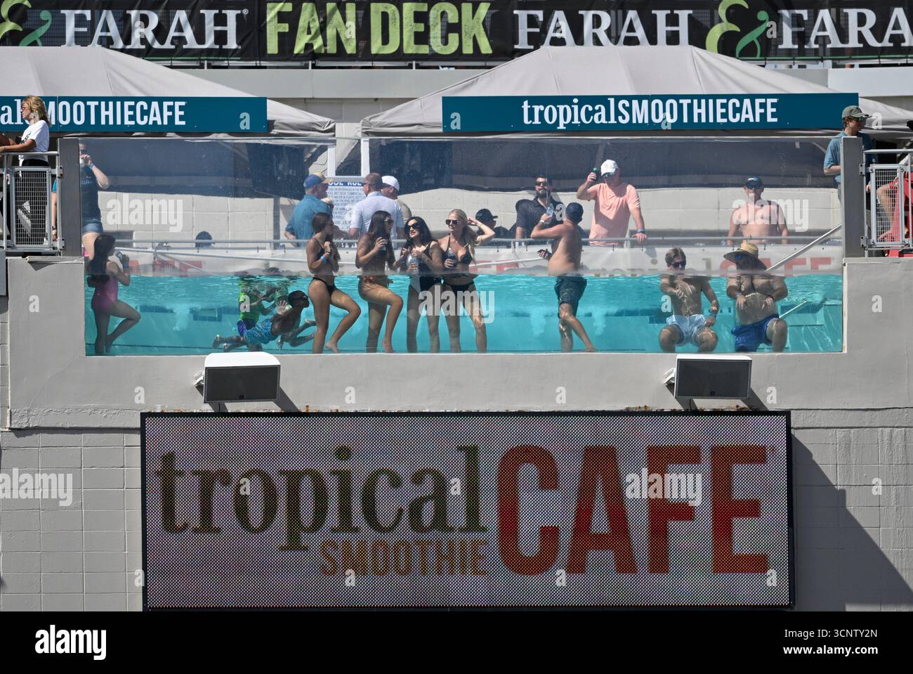 Spectators look on from the stadium pool during the second half of an ...