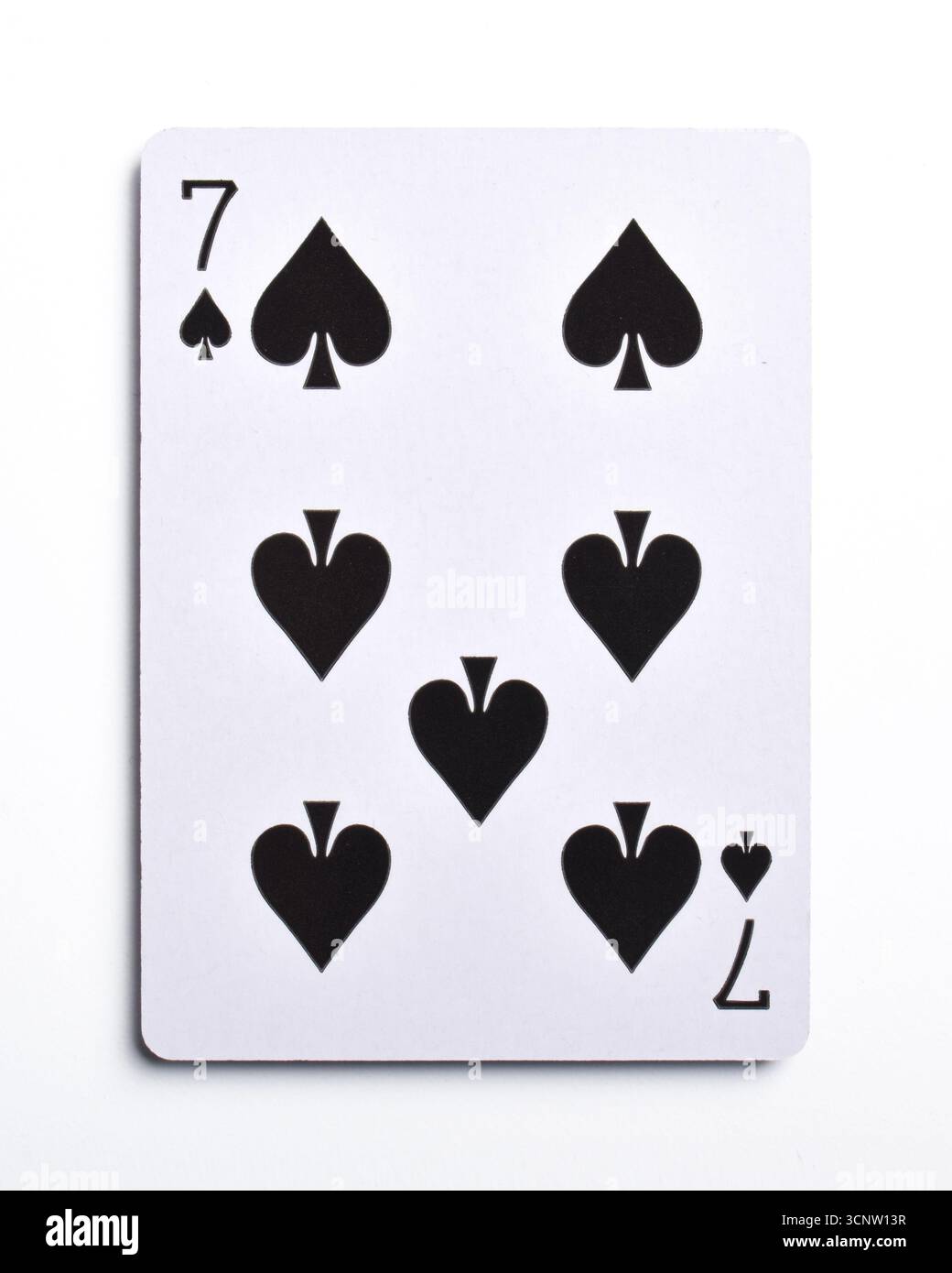 Seven of spades playing card, isolated on white background Stock