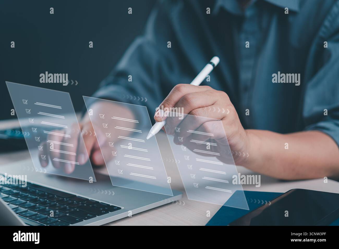 Close-up of hands using a futuristic interface for task management, and digital checklist satisfaction on a laptop. Stock Photo