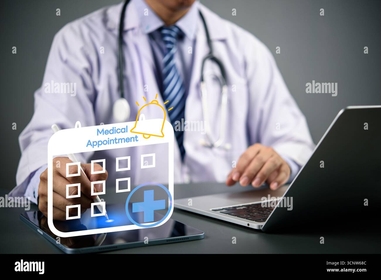 Doctor using digital tablet and laptop with medical appointment calendar icon, online booking system, e-health scheduling, and digital healthcare tech Stock Photo