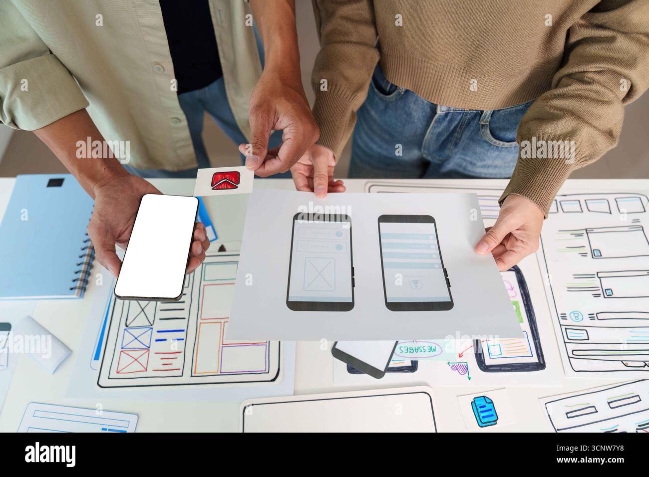 UX UI Design Collaboration. Team members discussing mobile app ...