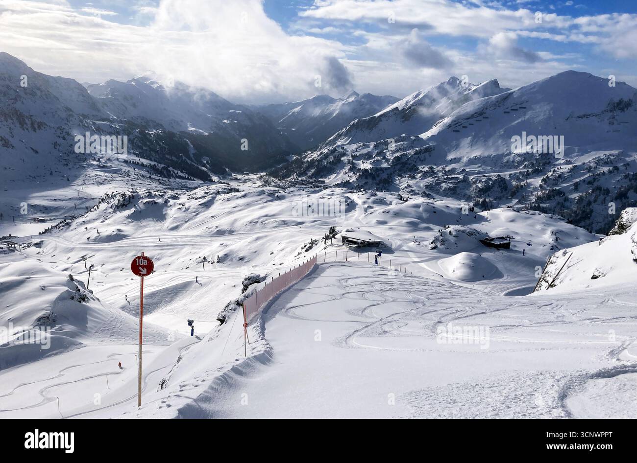 Beautiful view on snowy mountain range and ski slope in Austria Alps, Obertauern at winter Stock Photo