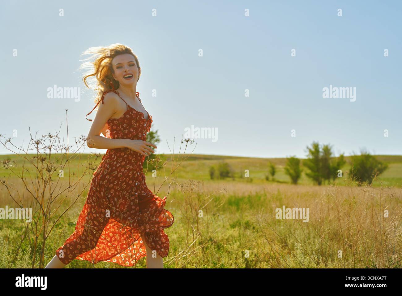 Red dress run hi-res stock photography and images - Alamy