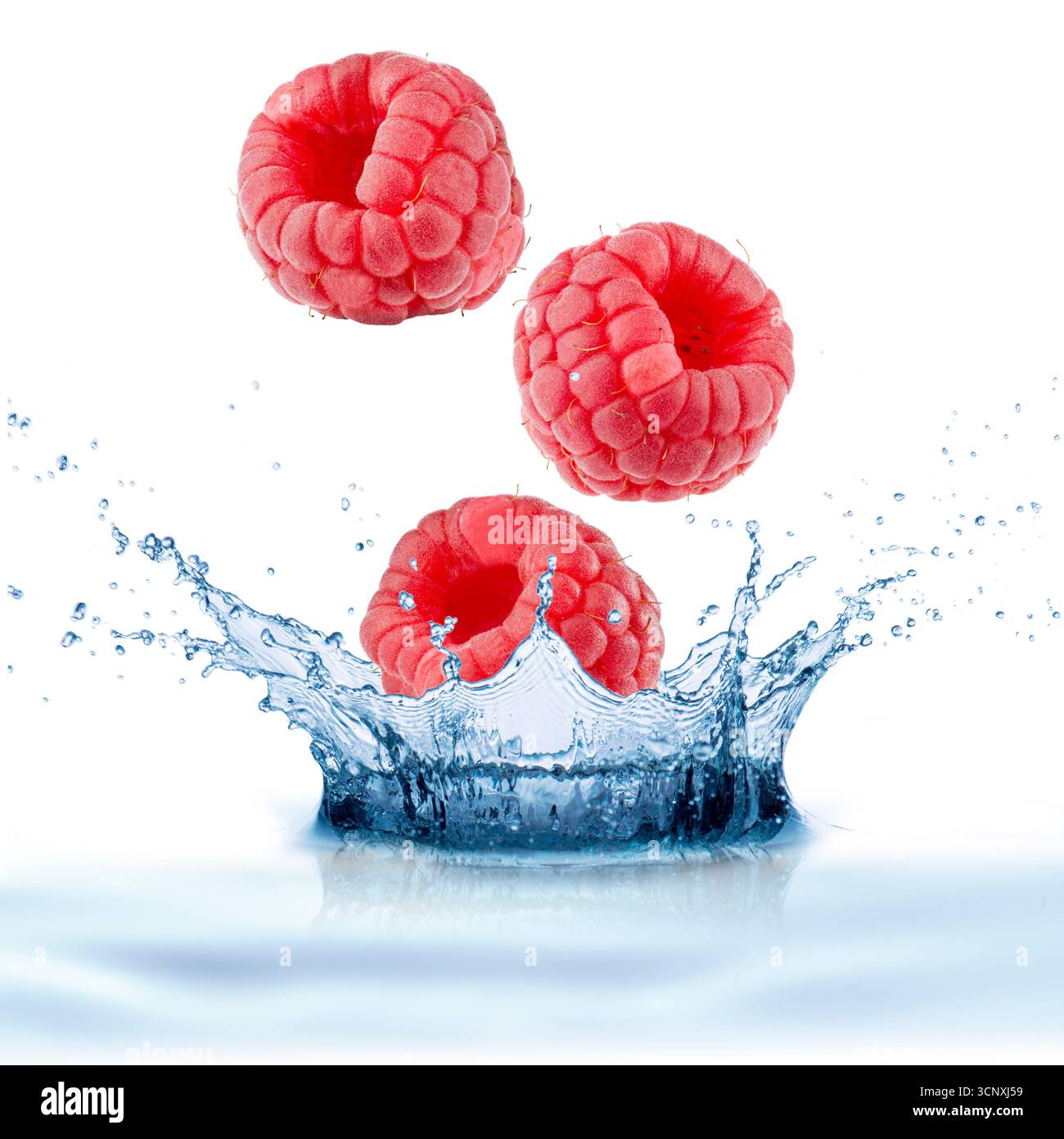 Raspberry Water Splash on White Background Stock Photo - Alamy