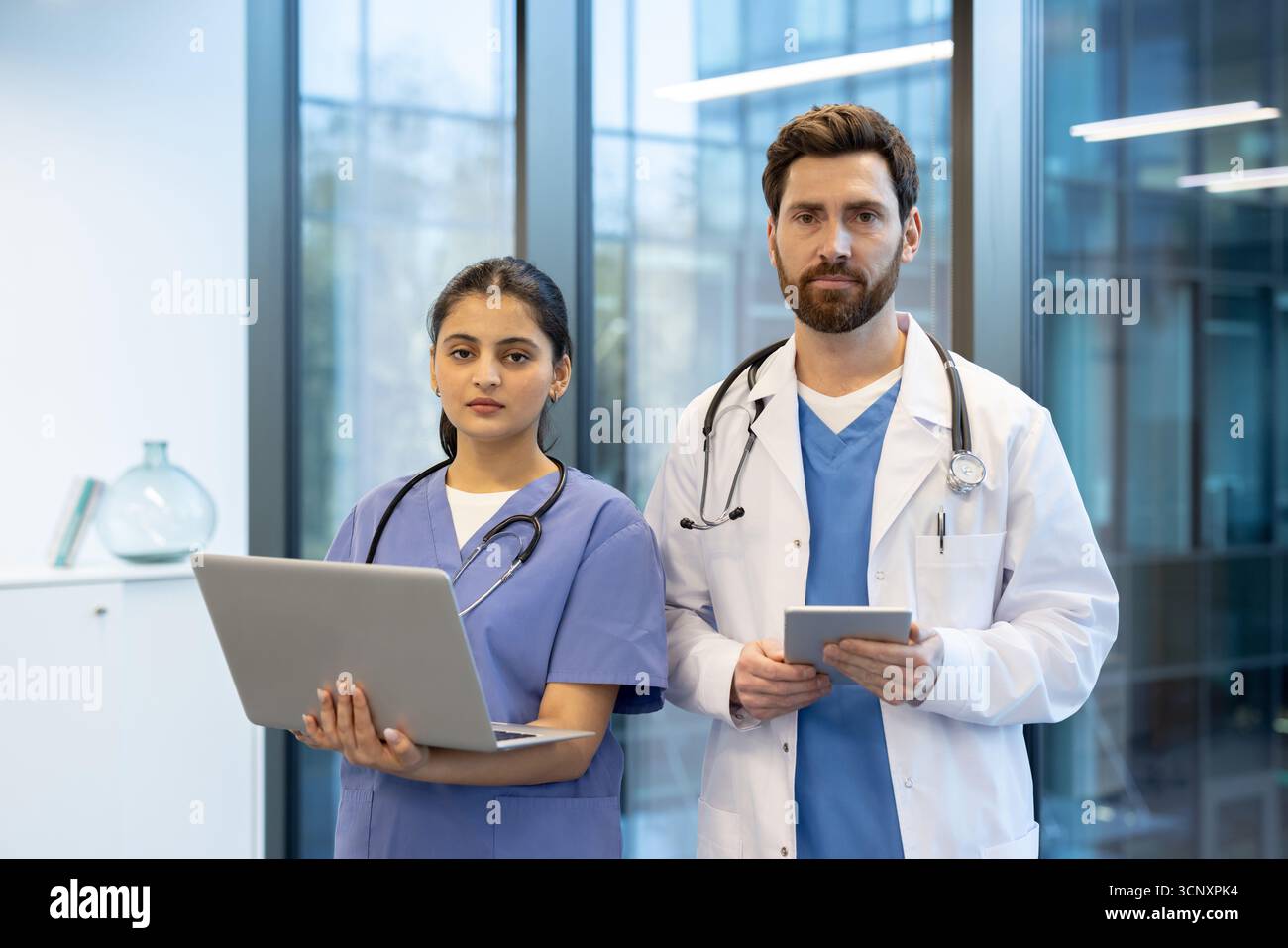Medical team in coat hi-res stock photography and images - Alamy