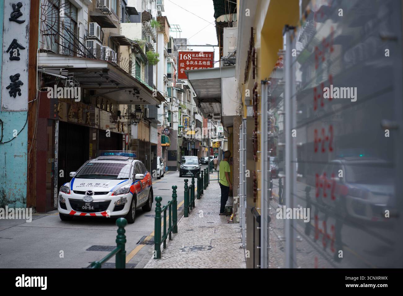 Signals Ragasa Macao, China. 23rd Sep, 2025. A police car patrols on the street to ...