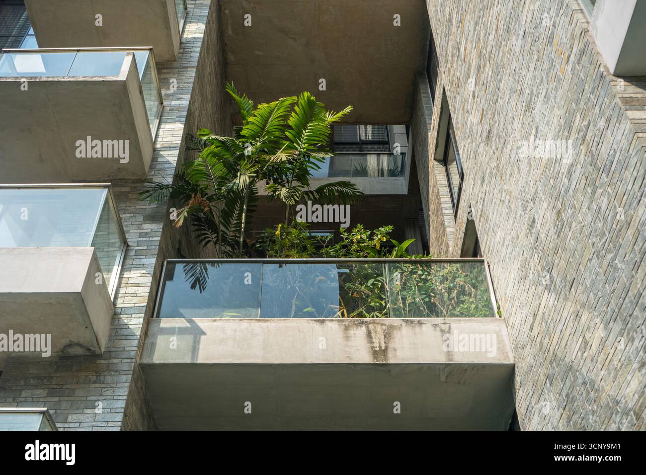 15 Wall Texture Ideas to Instantly Revive Your Interiors - Textured Apartment Walls With Large Windows And Modern Decor