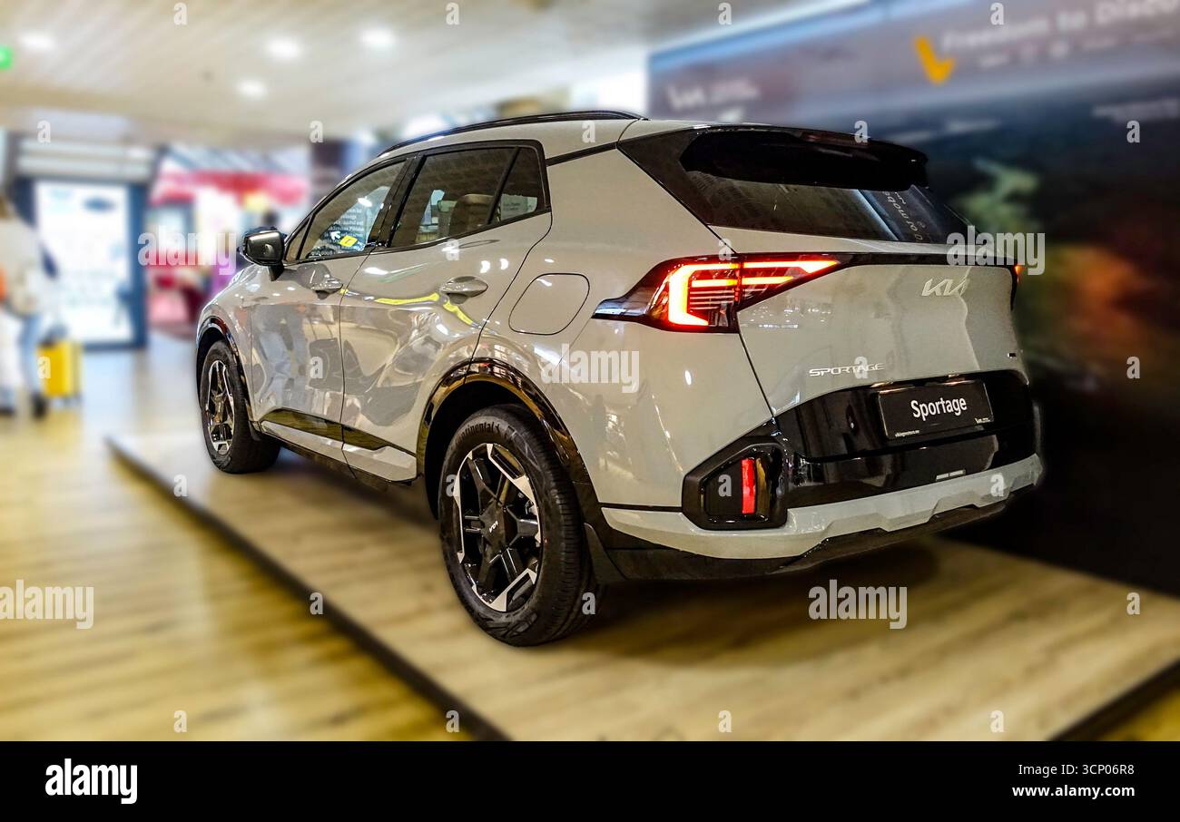 Kia Sportage SUV on display inside Lennart Meri Tallinn Airport, Estonia, highlighting modern automotive design and stylish compact crossover. Stock Photo