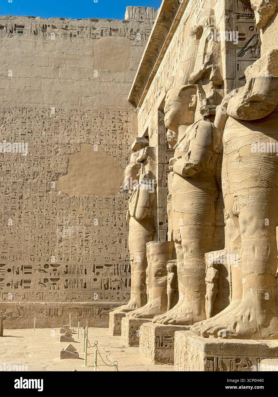 Osirid statues of Ramses III at Medinet Habu Temple in Luxor, Egypt ...