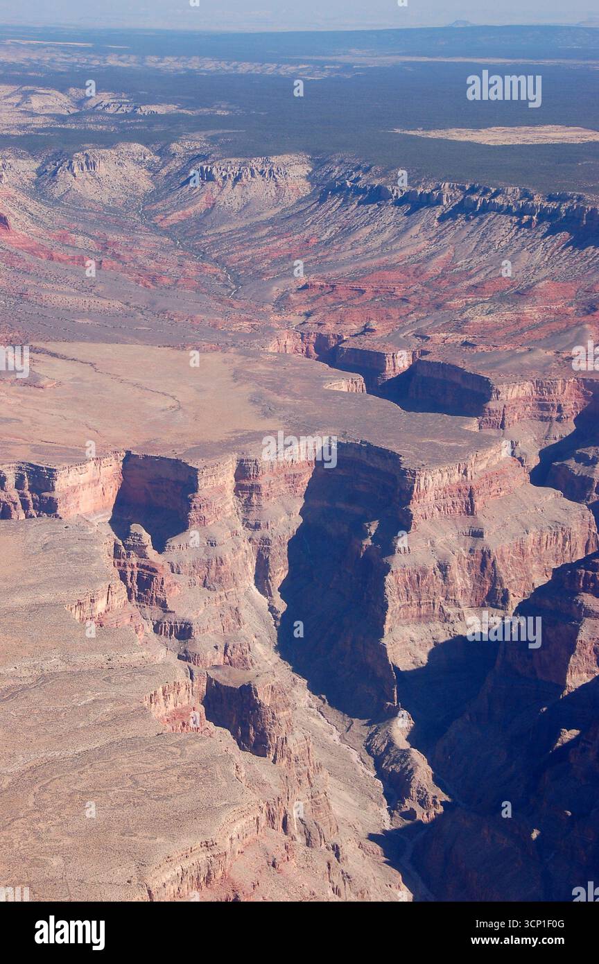 Aerial view of the Grand Canyon showcasing deep gorges, layered red ...