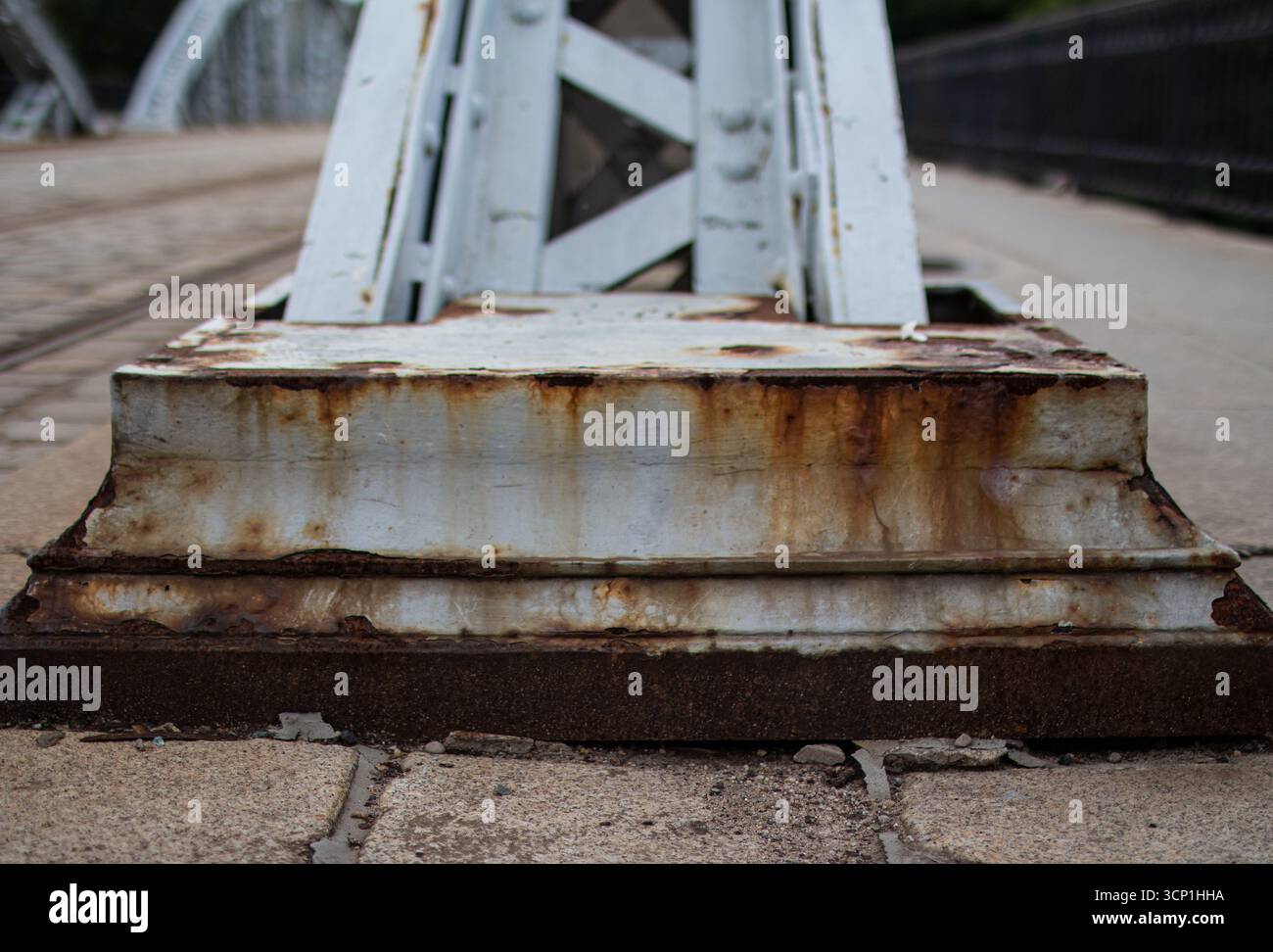 Rust Bridges Rusty base of a metal bridge shows wear from weather and time in an ...