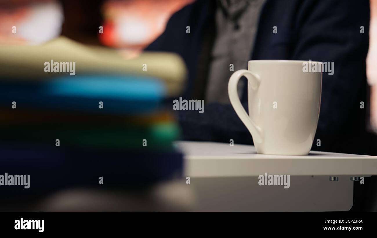 Senior engineer coding advanced AI algorithm in startup office, refining machine learning models to enhance automation. Asian CTO manager using coding platform in Silicon Valley workplace, close up Stock Photo