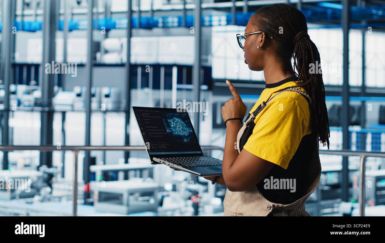 Engineer in smart factory using augmented reality to collect data on ...