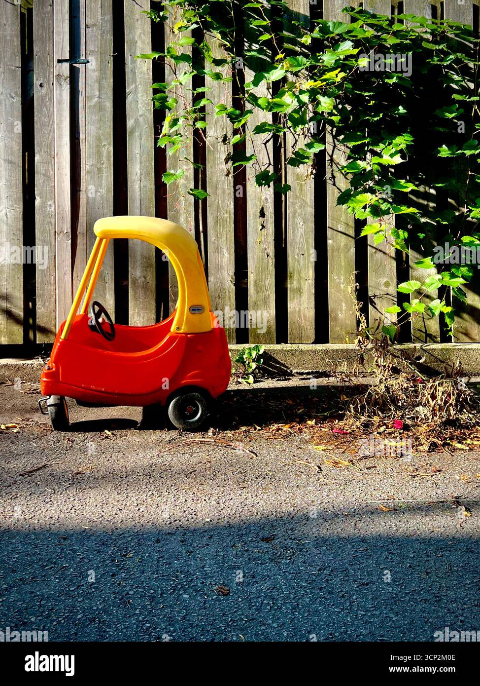 Child's plastic toy in an alley - Smartphone Captured Stock Image