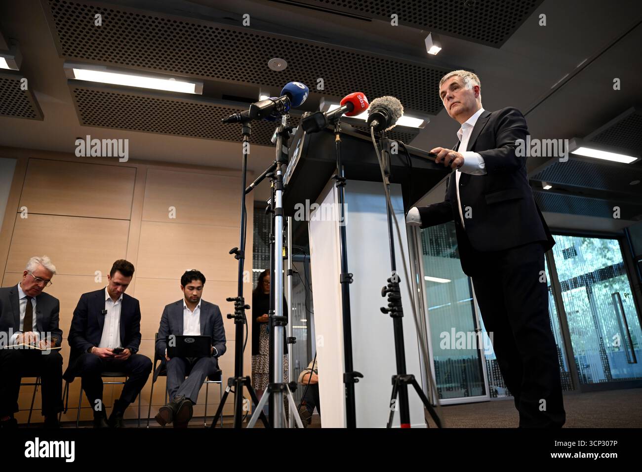 Optus Chief Executive Officer (CEO) Stephen Rue speaks to the media ...