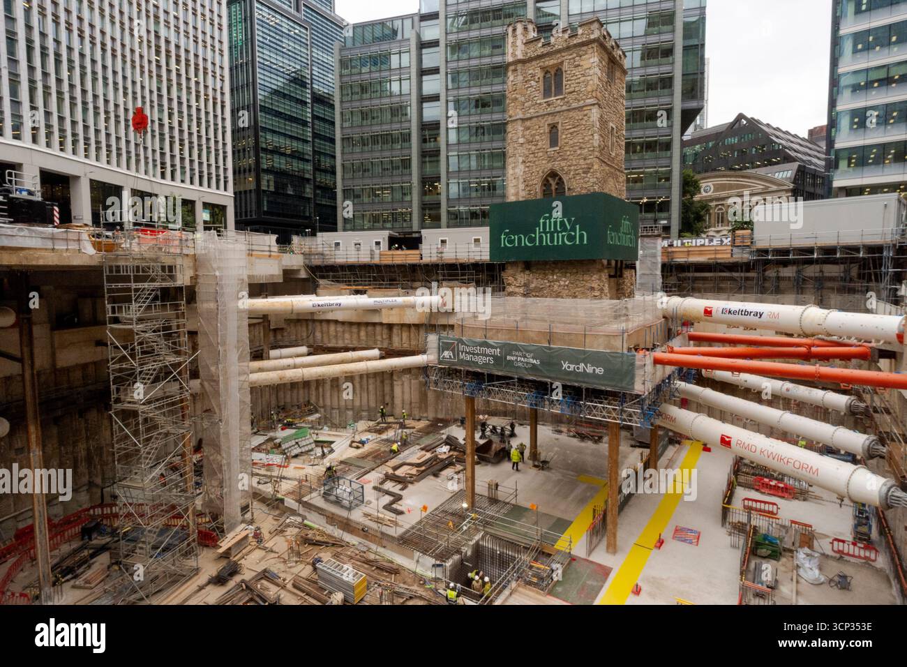 The 700-year-old tower of All Hallows Staining church is elevated on stilts during the 'Bottoming Out' ceremony of the new Fifty Fenchurch Street development in central London. Over 125,000 tonnes of earth has been removed underneath and around the medieval church tower to make way for the development of a new 650,000 sq ft 36-story office tower on the site, where the tower will form the center piece of a new public space. Picture date: Tuesday September 23, 2025. Stock Photo