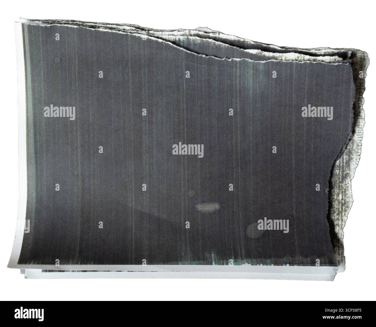 Severely torn black paper, intended to serve as a rectangular textbox isolated on white background with clipping path Stock Photo