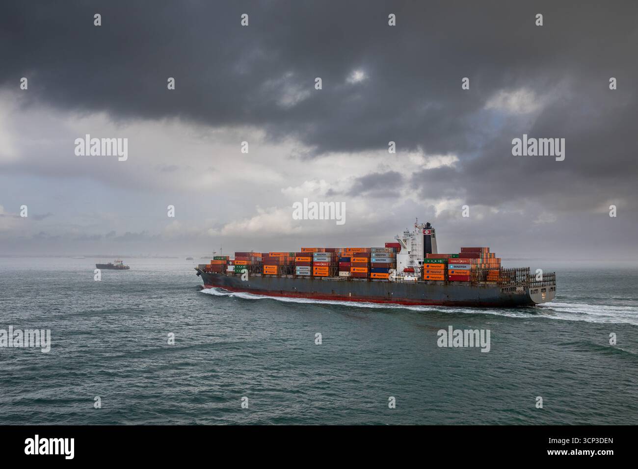 Container ship on it's way into Southampton Stock Photo