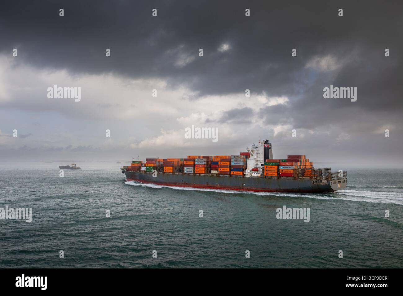 Container ship on it's way into Southampton Stock Photo