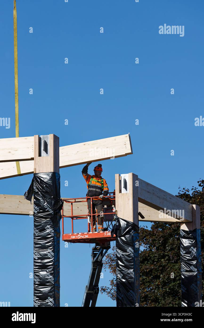 Workman Manchester Glulam laminated timber beam suspended from crane hi-res stock ...