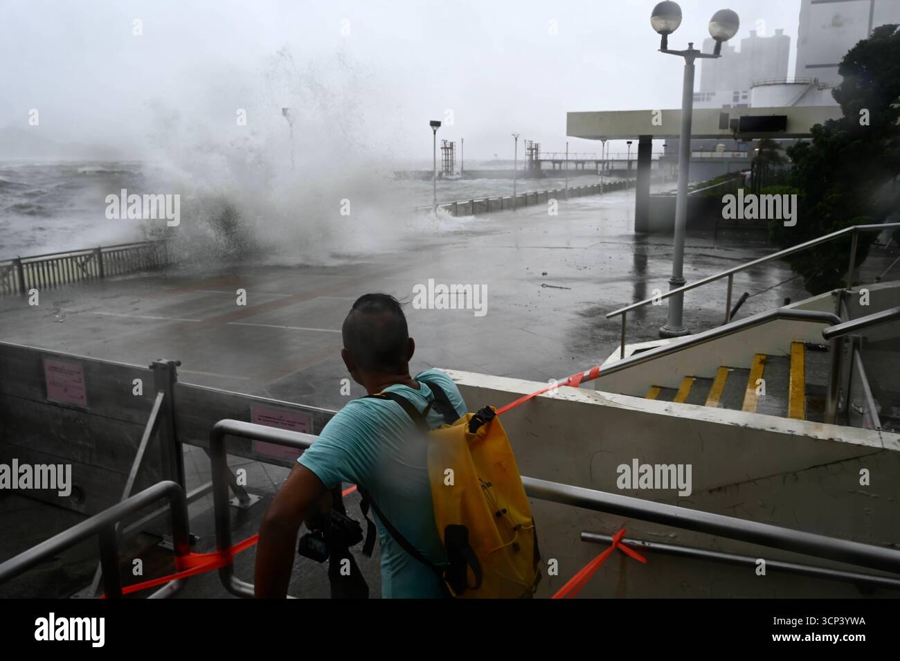 Signals Ragasa Hong Kong During Typhoon Ragasa A man watching the strong winds at Heng ...