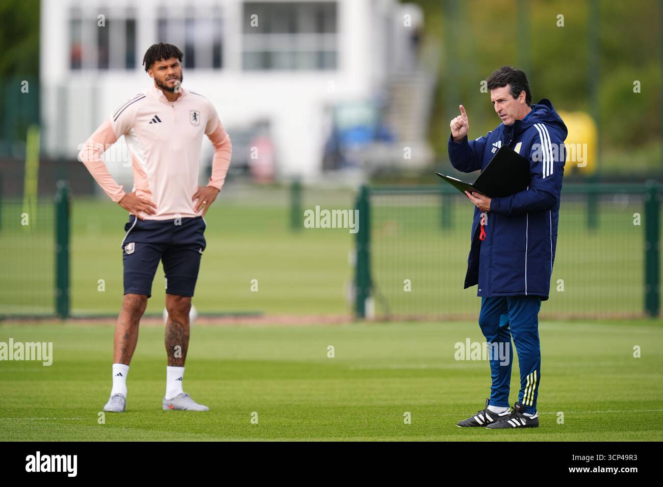 Aston Villa manager Unai Emery (right) and Tyrone Mings during a ...