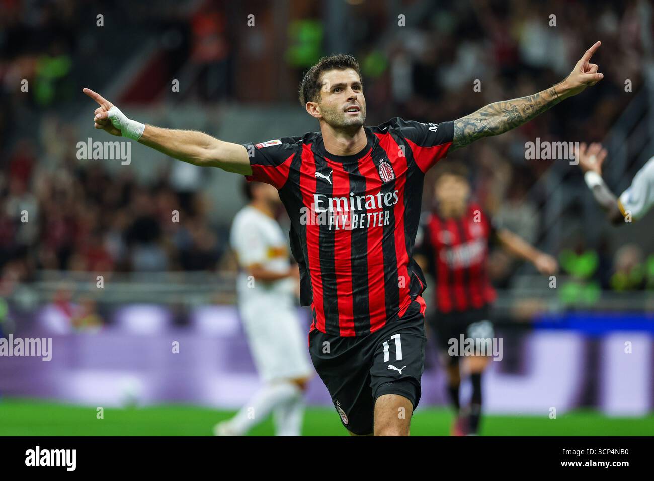 Christian Pulisic of AC Milan celebrates after scoring a goal during