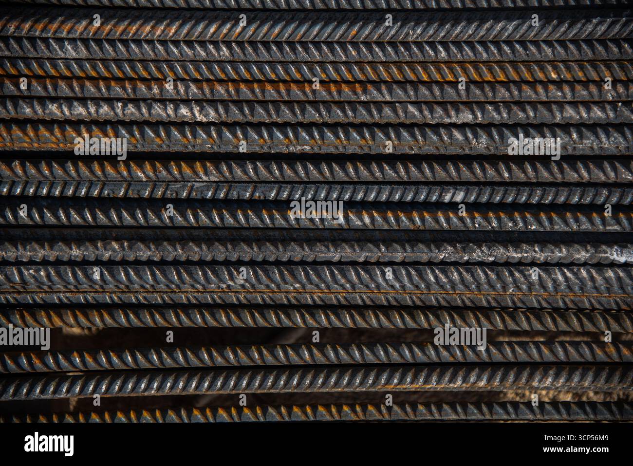 Close-up of stacked steel rebar rods used for construction ...