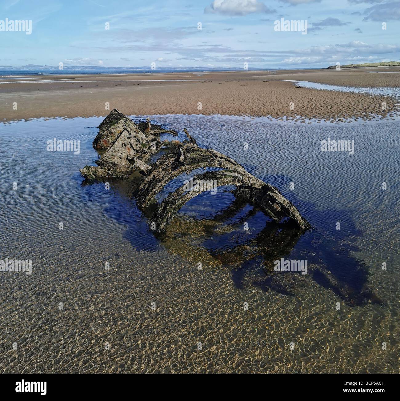 Wrecked WWII X-Class “Midget” submarines rust in Aberlady Bay near Edinburgh. X-Class was built as a new approach for taking down German warships. - Smartphone Captured Stock Image