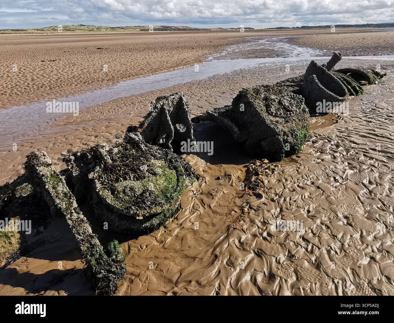 Wrecked WWII X-Class “Midget” submarines rust in Aberlady Bay near Edinburgh. X-Class was built as a new approach for taking down German warships. - Smartphone Captured Stock Image