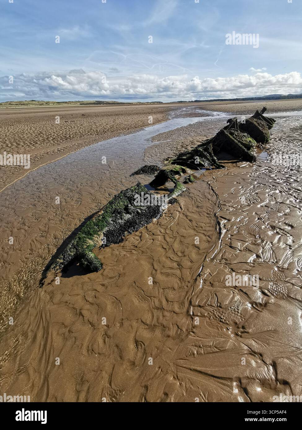 Wrecked WWII X-Class “Midget” submarines rust in Aberlady Bay near Edinburgh. X-Class was built as a new approach for taking down German warships. - Smartphone Captured Stock Image